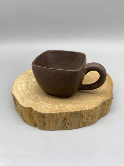 Purple clay cup with handle