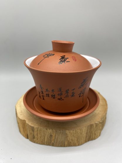 Red Clay Gaiwan with Flowing Calligraphy